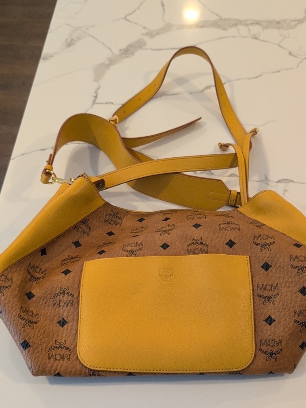 MCM yellow and brown hobo bag